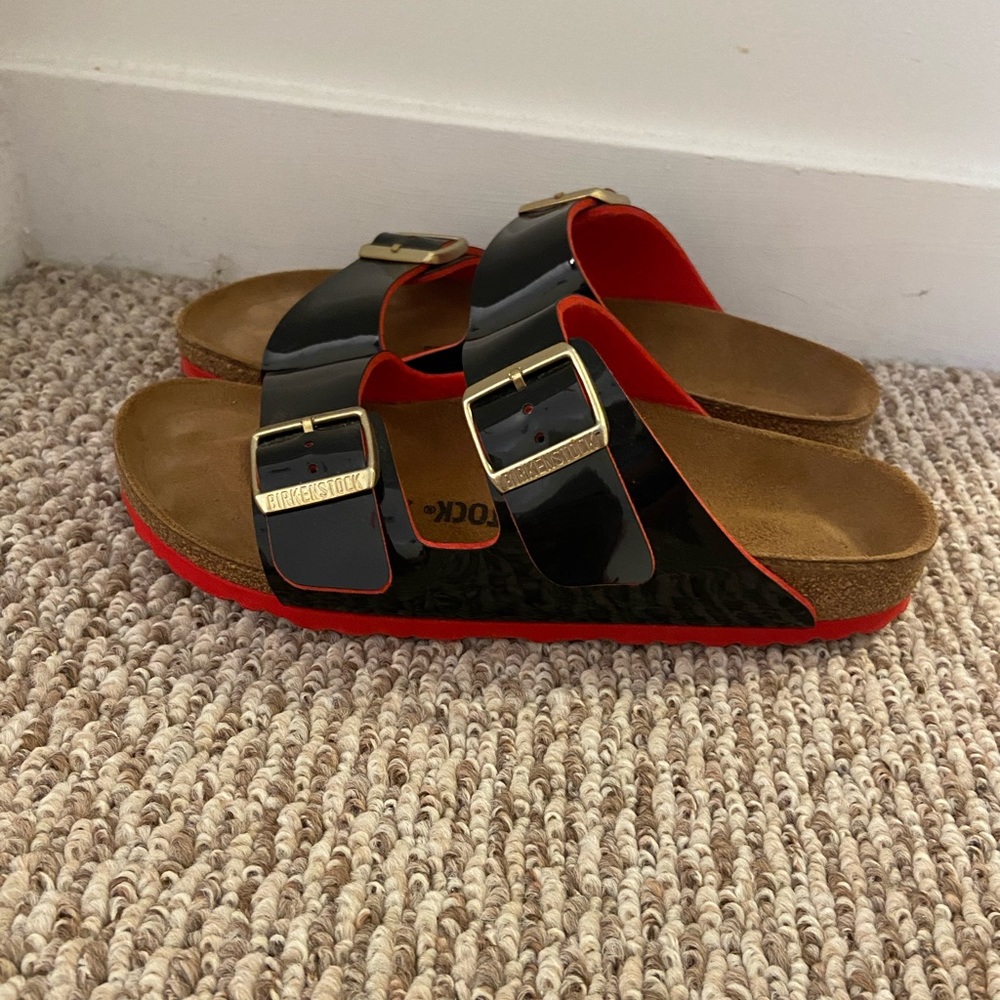 Black and red birkenstock’s
